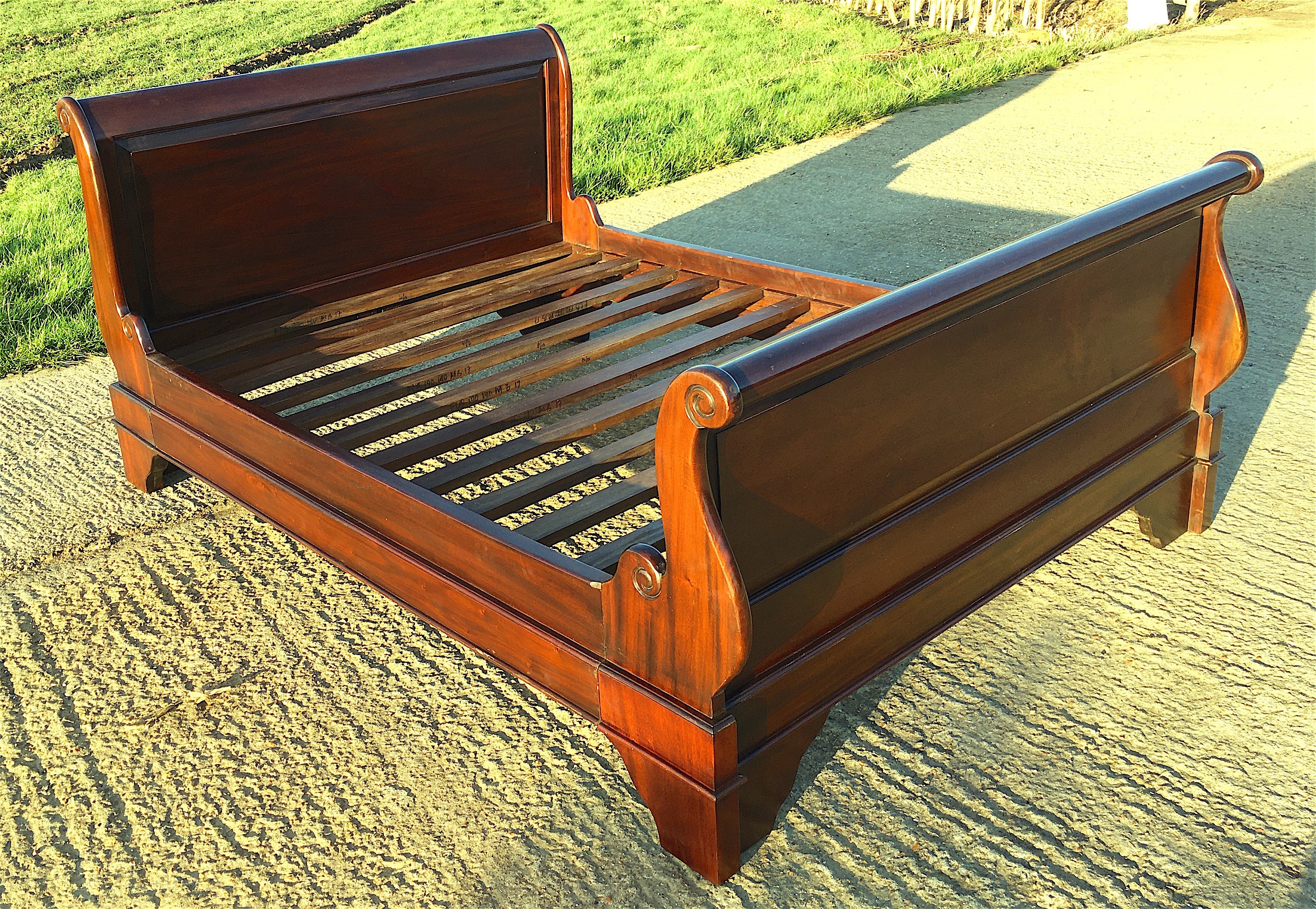 A French style mahogany sleigh bed, length 210cm, width 148cm